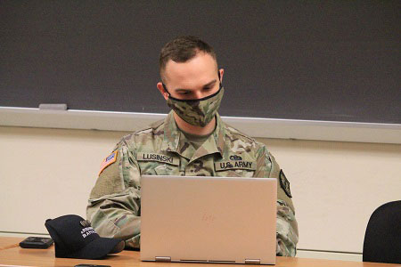 A cadet studies in the classroom.